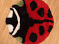 детский из овчины Божья коровка  круглый 